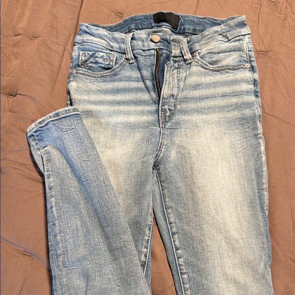 Buckle Black Skinny Jeans with Vintage Faded Look